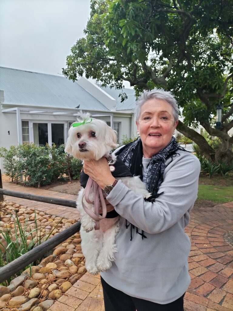 Dog and owner at pet-friendly retirement estate